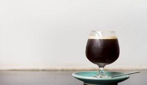 An espresso martini mocktail in a glass