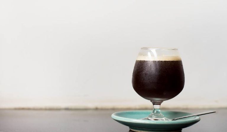 An espresso martini mocktail in a glass