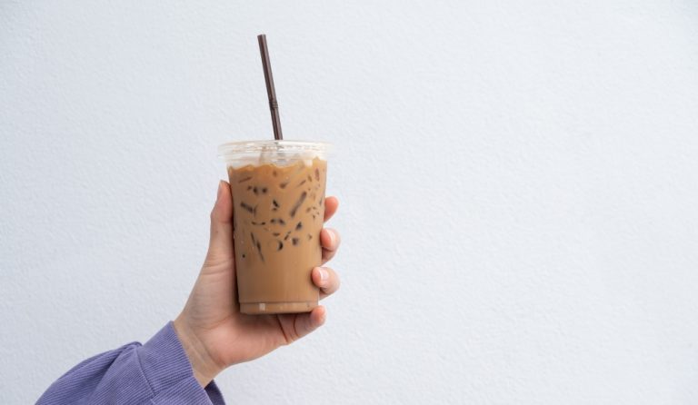 cold brew held in hand