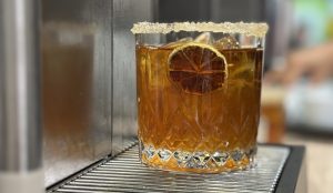 Glass with cold tea brewed with a Hardtank commercial cold brew machine.