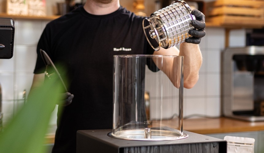 Choosing the best cold brew coffee machine 3 Removing the filter basket to add ingredients to the best cold brew coffee machine.