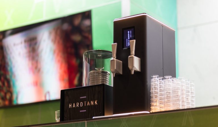How a commercial drink machine boosts efficiency & menu variety 4 A Hardtank commercial drink machine on a standee.