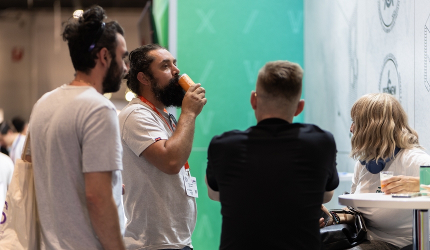 A person drinking from an RTD tea can.