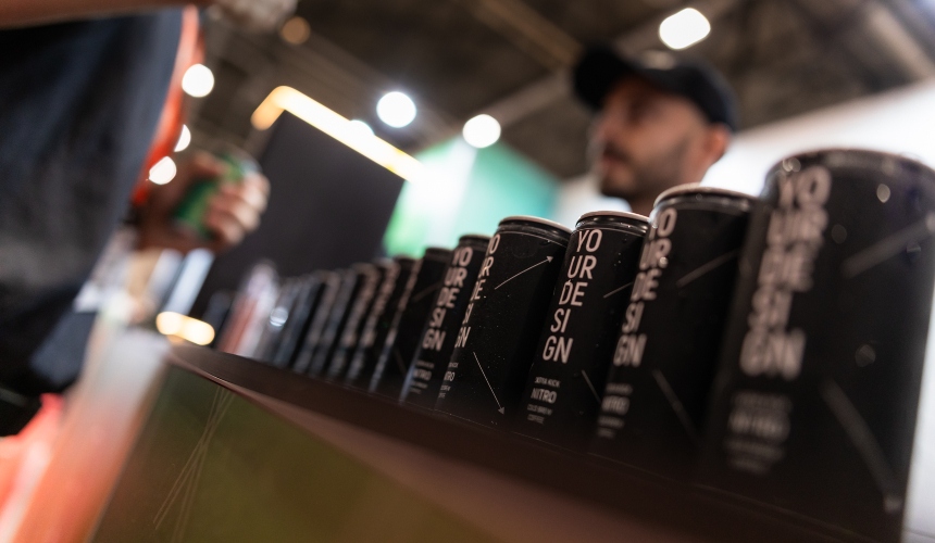 A row of coffee can packaging from Hardtank's private label services.