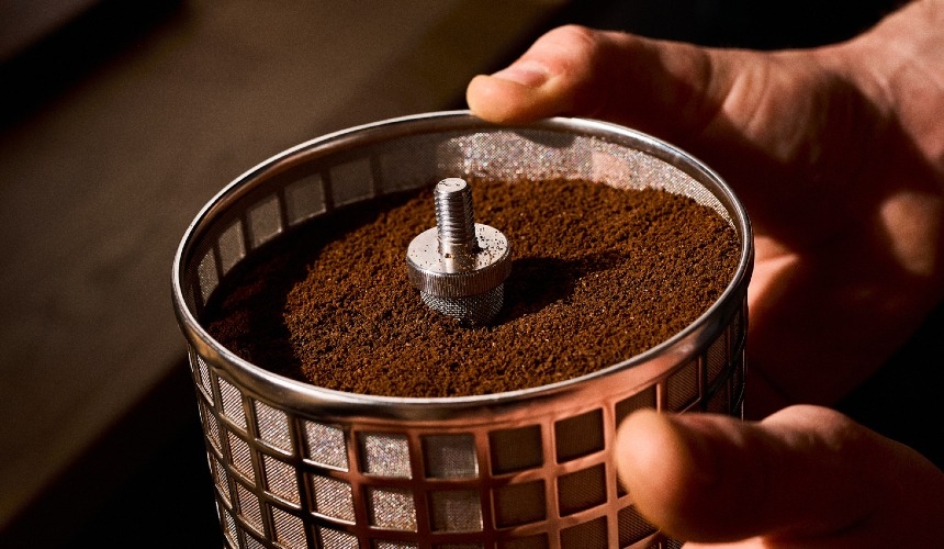 The Hardtank's extraction basket containing ground coffee for cold brew coffee service.
