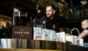A barista preparing cold brew coffee, one of the biggest Gen Z coffee trends.