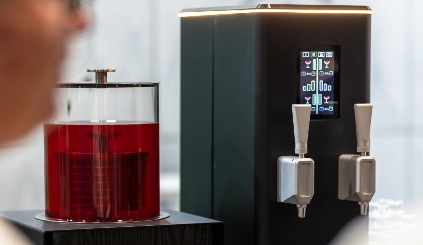 A Hardtank cold brew coffee system next to a nitro tap.