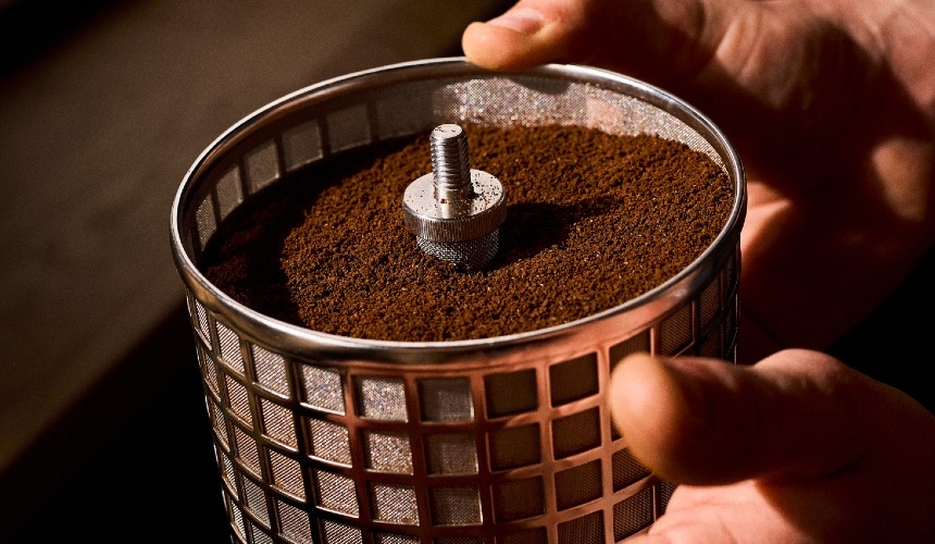 The carbon footprint of coffee and cold brew: What operators should know 3 Ground coffee in the filter basket of a Hardtank cold brew coffee system.