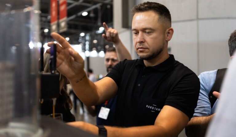A barista using Hardtank's cold brew coffee tap system.