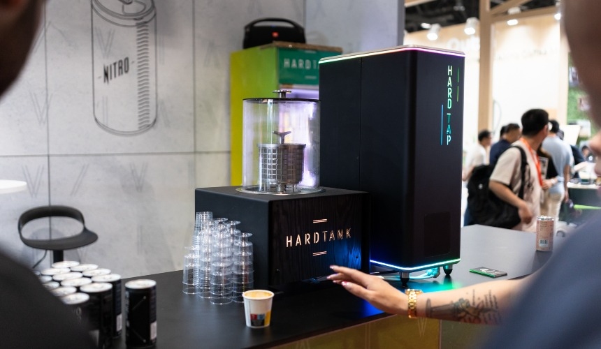 A Hardtank system next to a Hardtap dispenser.
