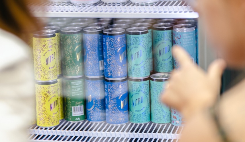 What to look for in a cold brew private label manufacturer 3 A fridge containing cold brew private label cans from Hardtank.