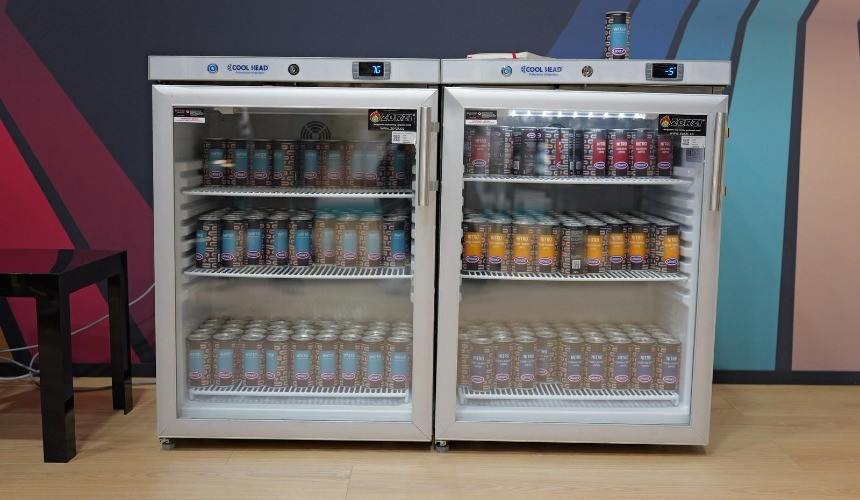 A fridge containing commercial cold brew cans.