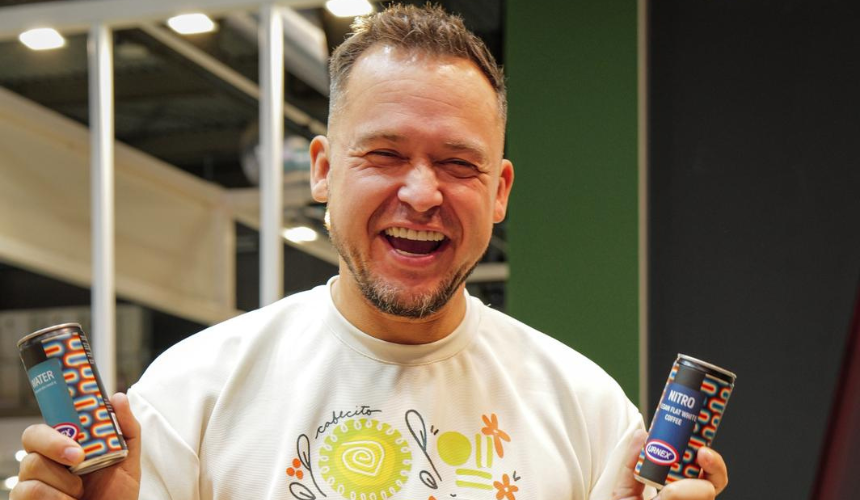 How popular is RTD cold brew coffee? 2 Smiley person holding RTD cold brew cans